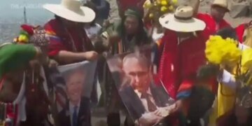 Шаманы погадали на портретах Путина и Байдена и озвучили прогноз на 2024 год. ВИДЕО
